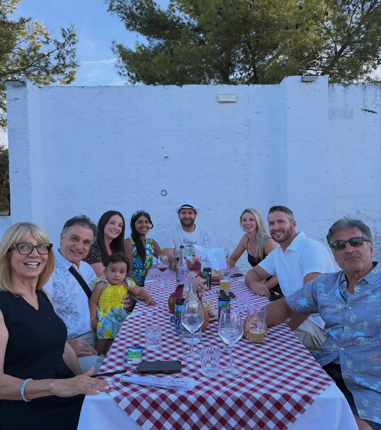 Family dinner around a checkered tablecloth